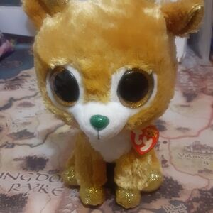 Ty Beanie Glitzy the reindeer 11 inch plush with tag. Some scuffs on the plastic